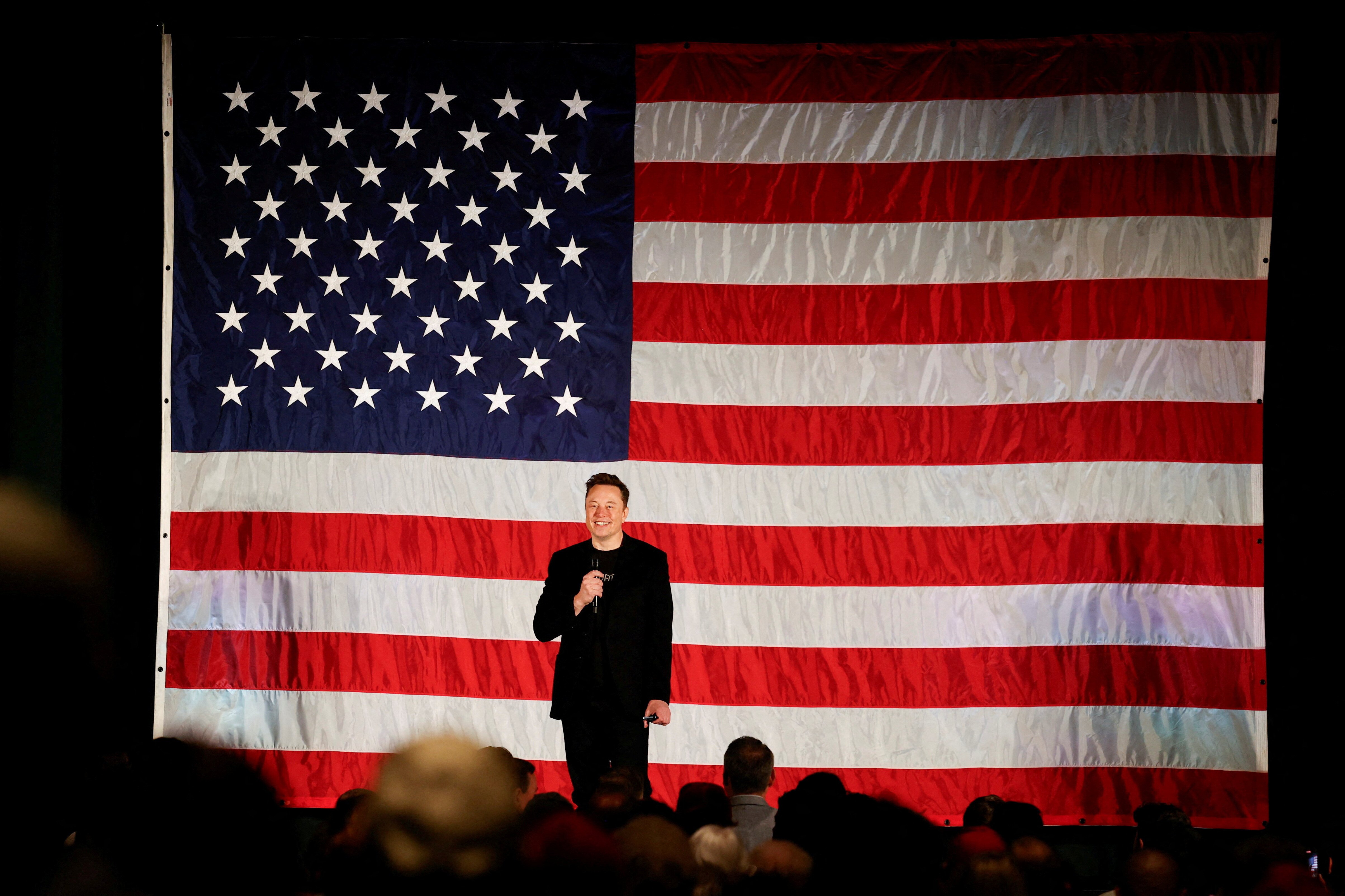 Tesla CEO and X owner Elon Musk speaks about voting during an America PAC Town Hall in Folsom, Pennsylvania, U.S., October 17, 2024.