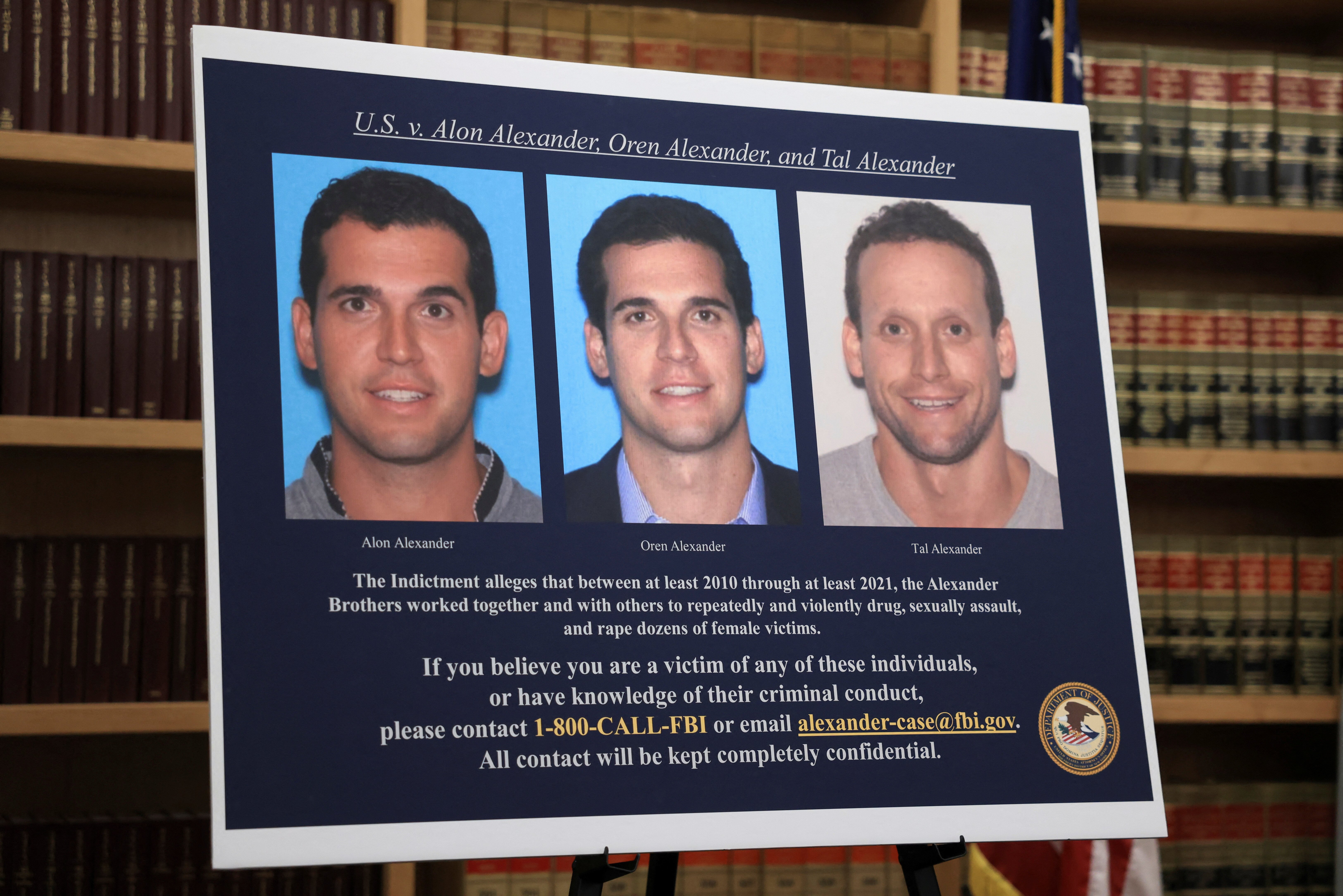 The pictures of the three high profile real estate agent brothers Alon Alexander, Oren Alexander, and Tal Alexander, on charges of sex trafficking and drugs, are displayed at 26 Federal Plaza in New York City, New York U.S., December 11, 2024. REUTERS/Kent Edwards