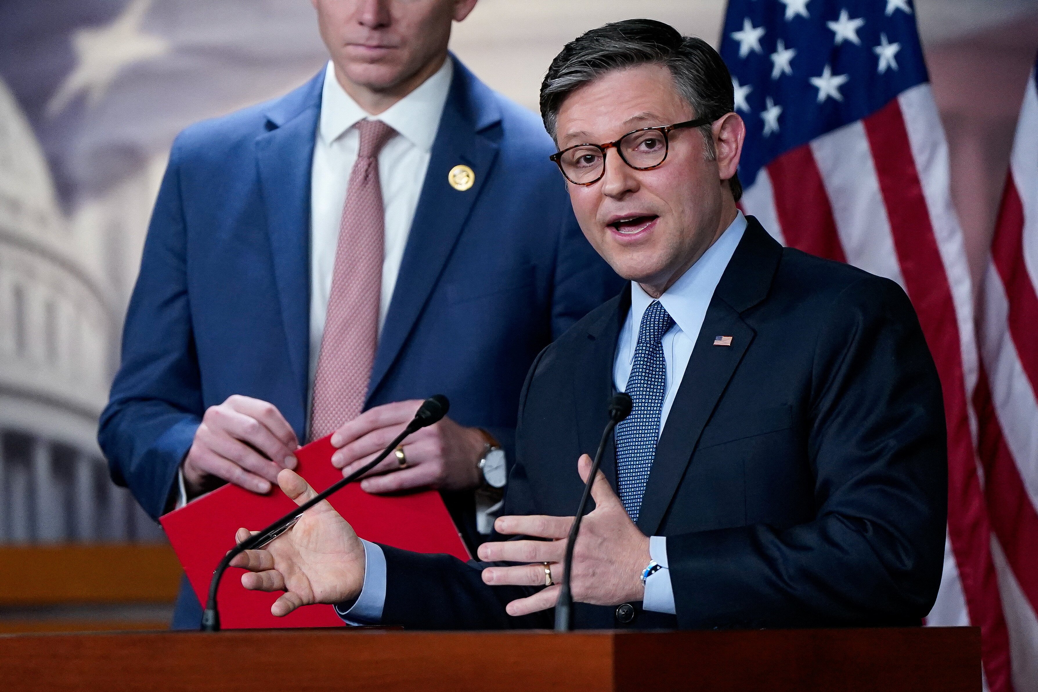 U.S. House Speaker Mike Johnson (R-LA) speaks to reporters following a House Republican conference meeting on Capitol Hill in Washington, U.S., December 17, 2024. REUTERS