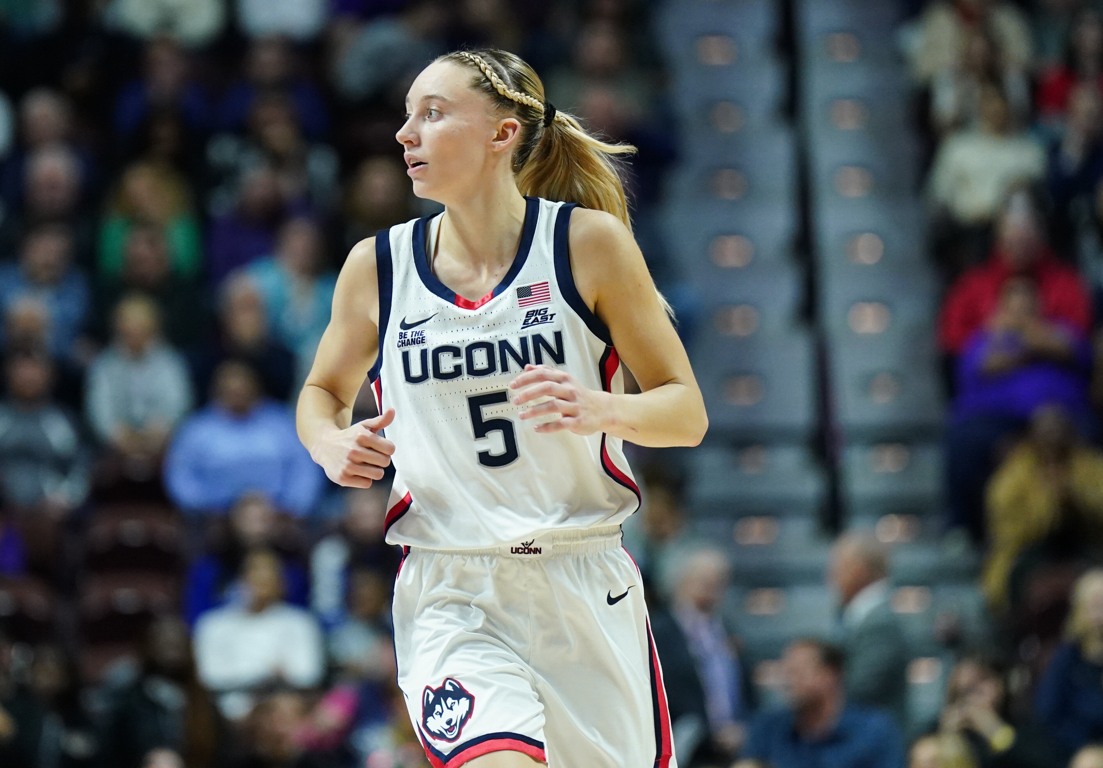 Dec 17, 2024; Uncasville, Connecticut, USA; UConn Huskies guard Paige Bueckers (5) returns up court against the Iowa State Cyclones in the first half at Mohegan Sun Arena. Photo Credit: David Butler II-Imagn Images