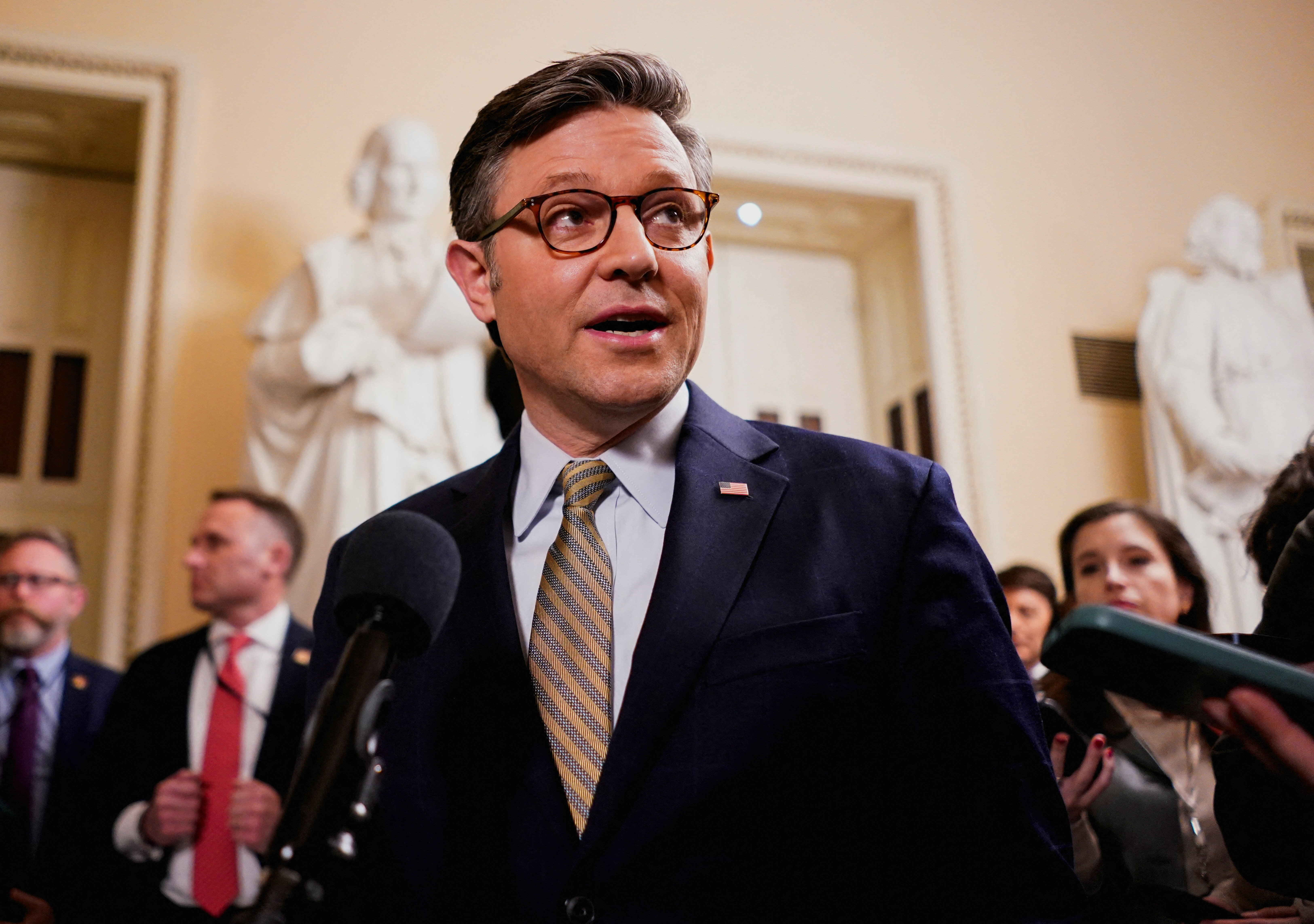 U.S. House Speaker Mike Johnson (R-LA) speaks to the media following the passage of a spending legislation to avert a government shutdown, on Capitol Hill in Washington, U.S., December 20, 2024. REUTERS/Nathan Howard