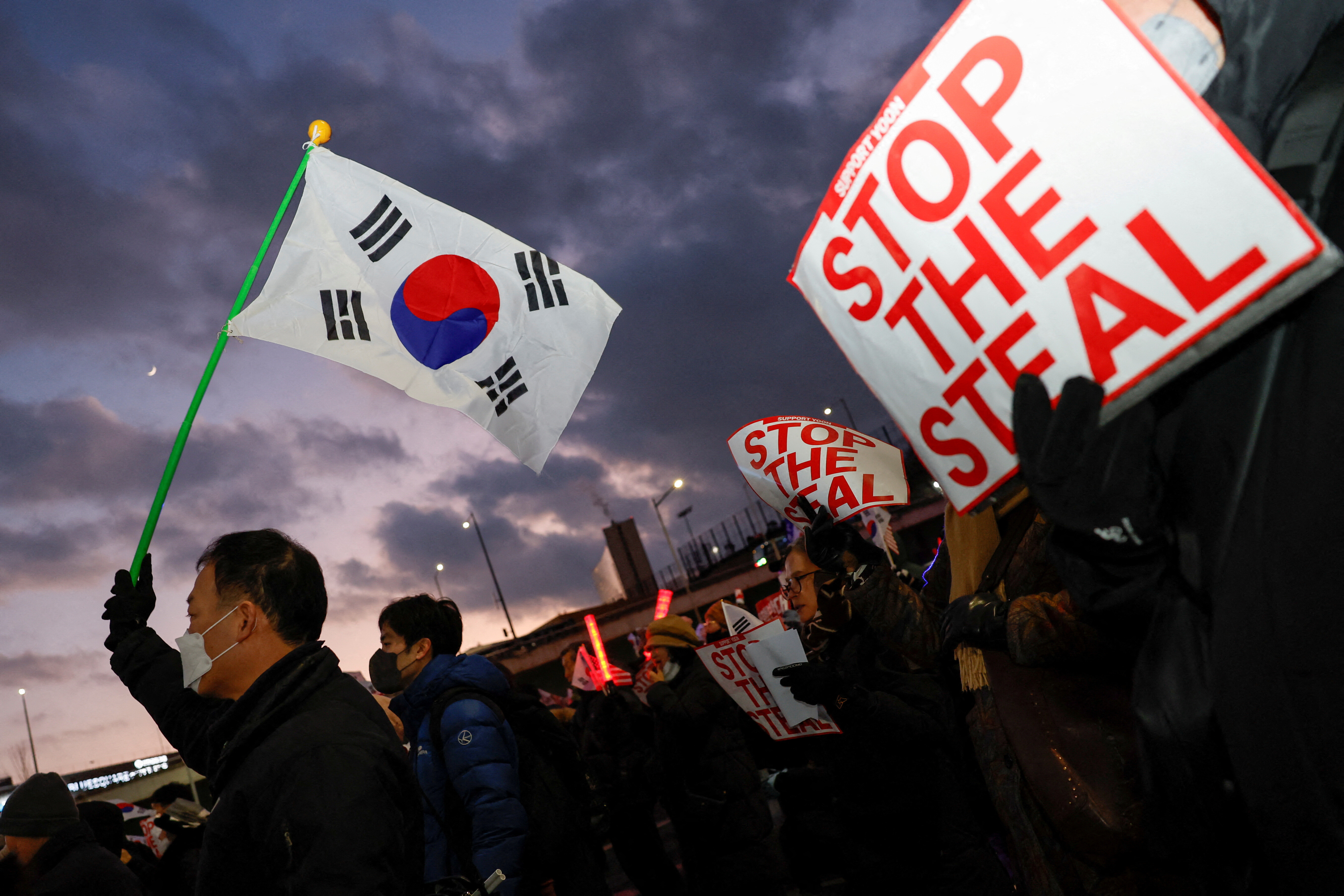 South Korea's impeached president defies warrant after hourslong standoff