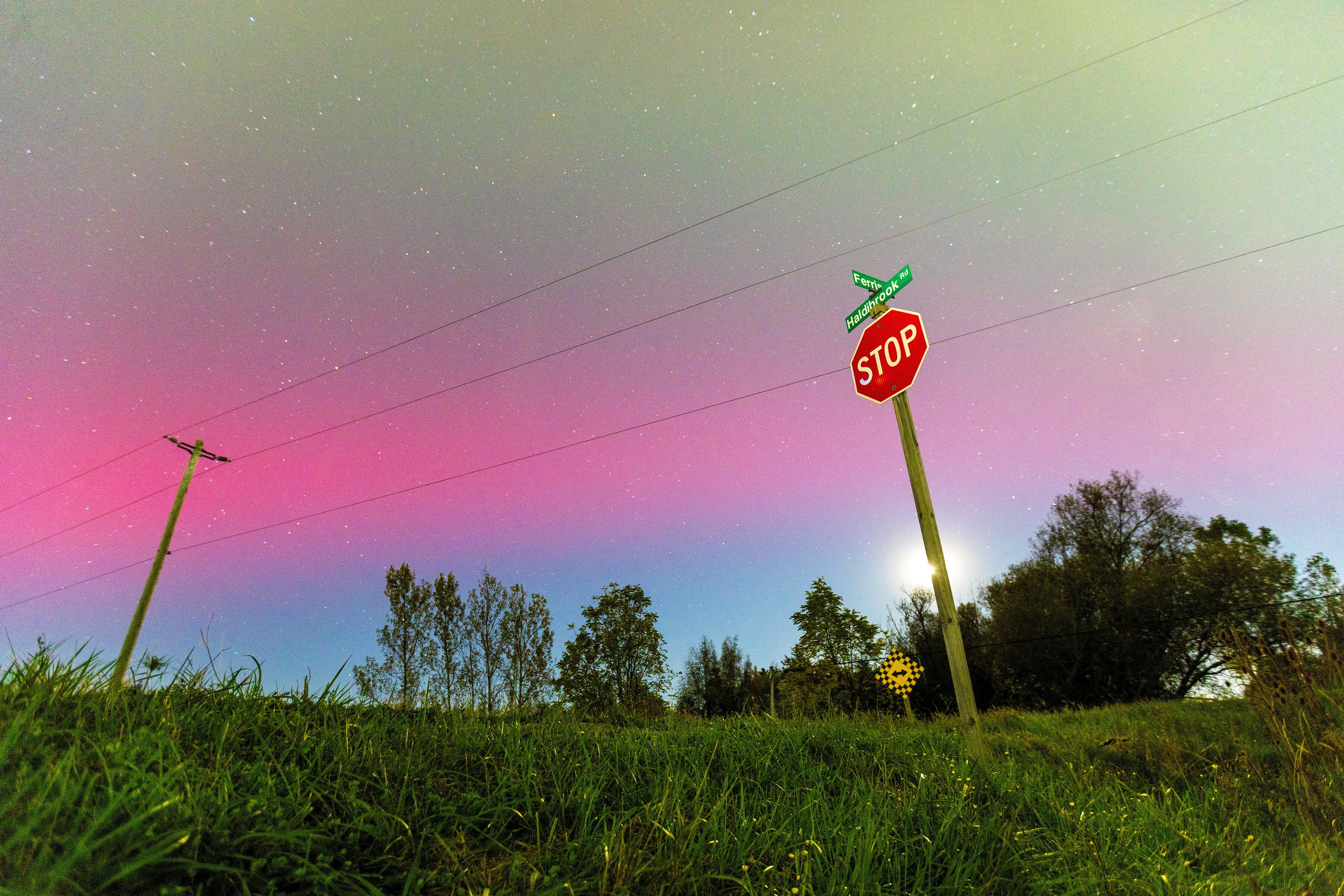 Aurora Borealis, or as they are also known, northern lights, illuminate the sky in Haldimand County, near Hamilton, Ontario, Canada, October 10, 2024. REUTERS/Carlos Osorio