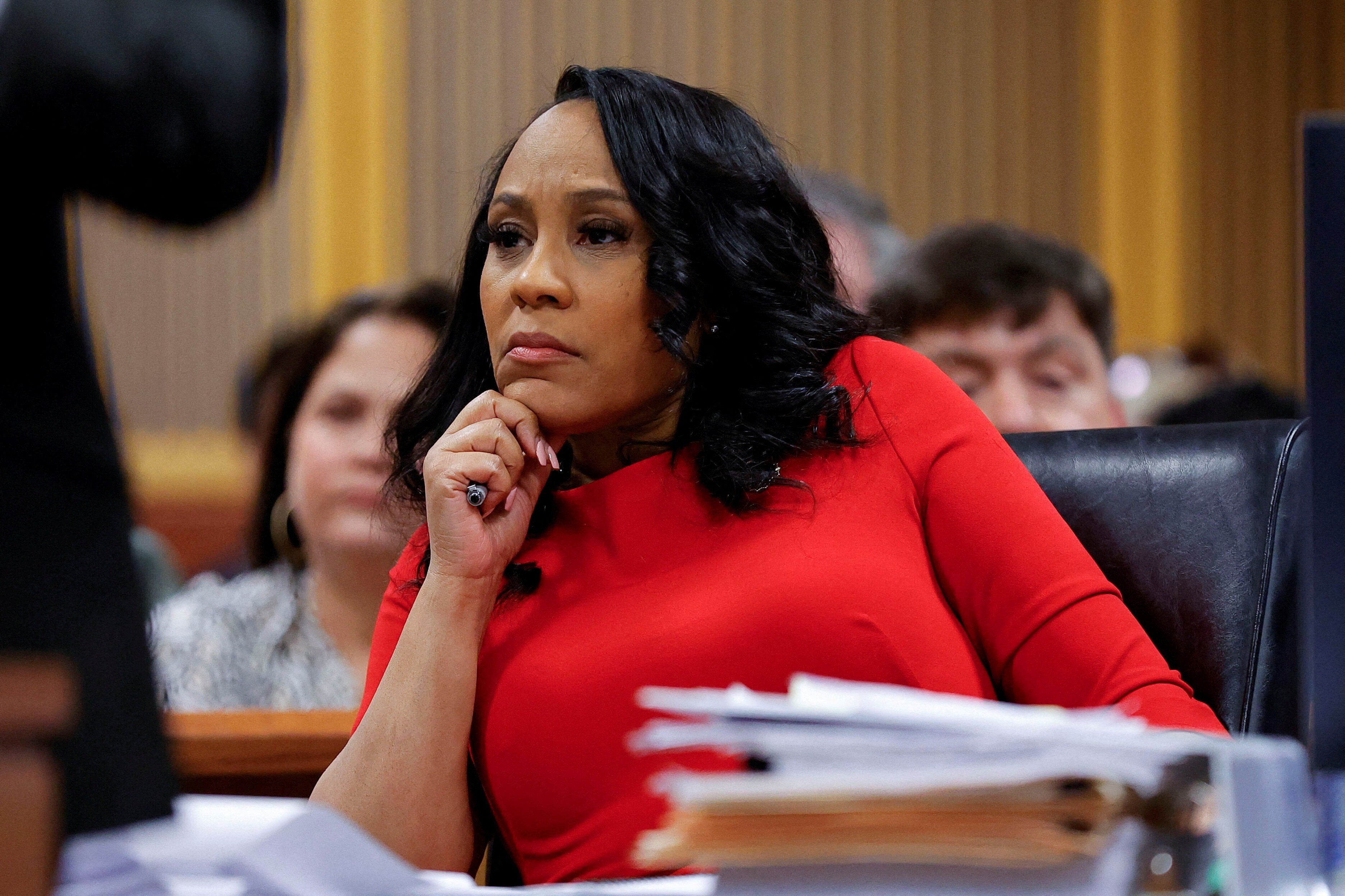 FILE PHOTO: Fulton County District Attorney Fani Willis attends a hearing on the Georgia election interference case, March 1, 2024, in Atlanta, Georgia, U.S. Alex Slitz/Pool via REUTERS