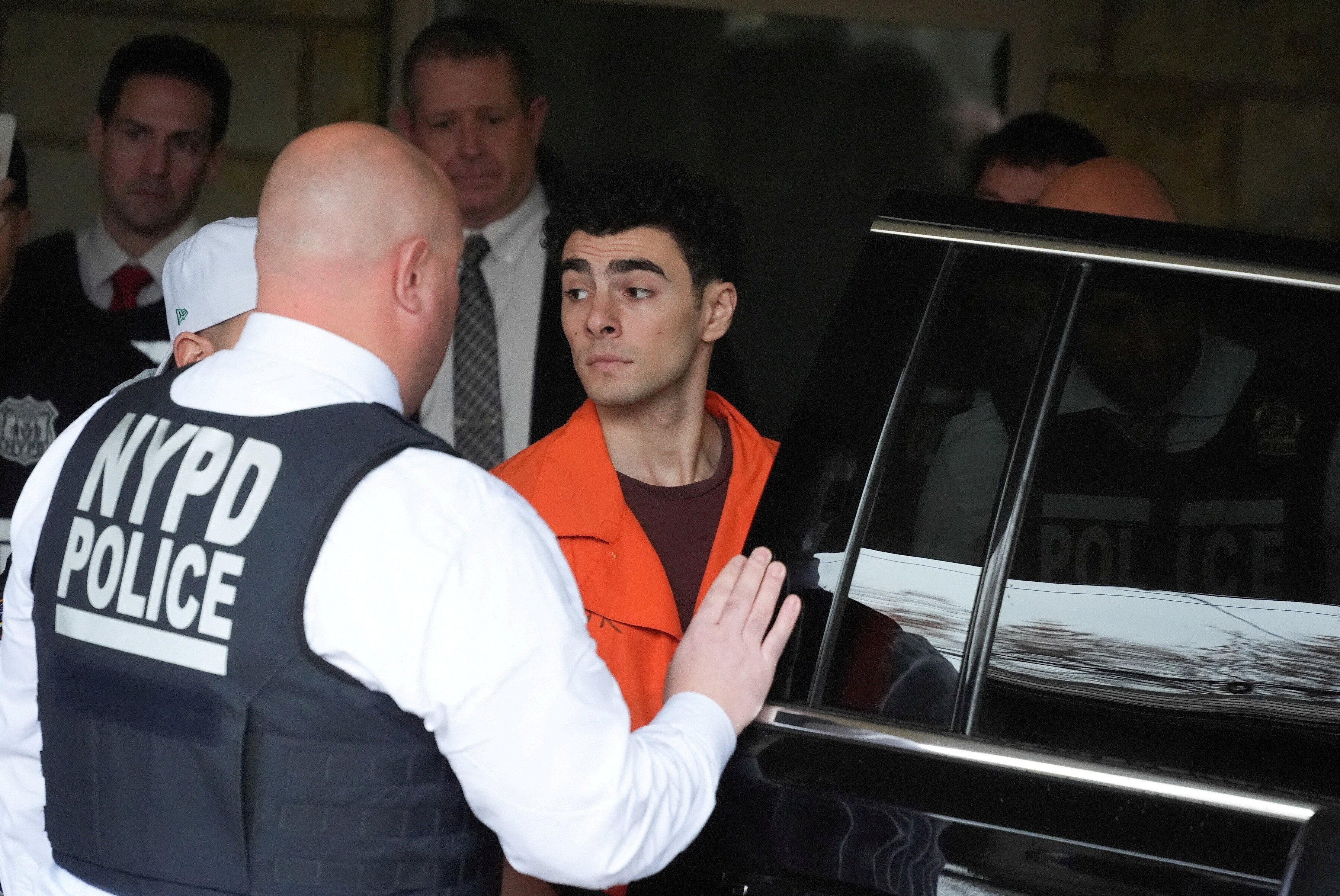 Luigi Nicholas Mangione leaves at Blair County Courthouse in Hollidaysburg, Pennsylvania U.S., Thursday, Dec. 19, 2024. Gene J. Puskar/Pool via REUTERS