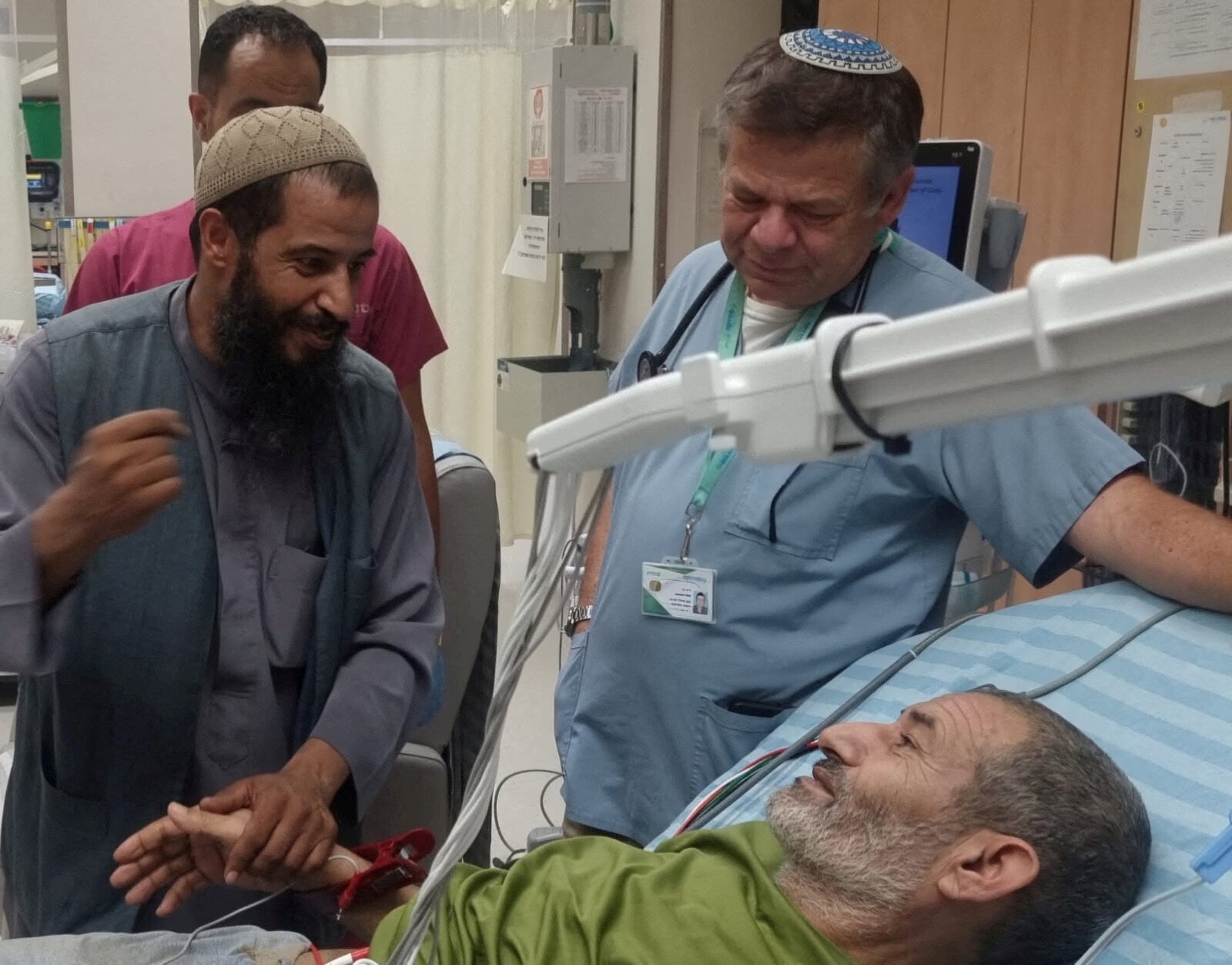 Qaid Farhan Alkadi, a Bedouin Israeli hostage who was kidnapped in the deadly October 7 Hamas attack, is greeted by a loved one after being rescued by Israeli forces at Soroka Medical Center in Beersheba, Israel, in this handout photo from August 27, 2024. Courtesy of Soroka Medical Center/Handout via REUTERS