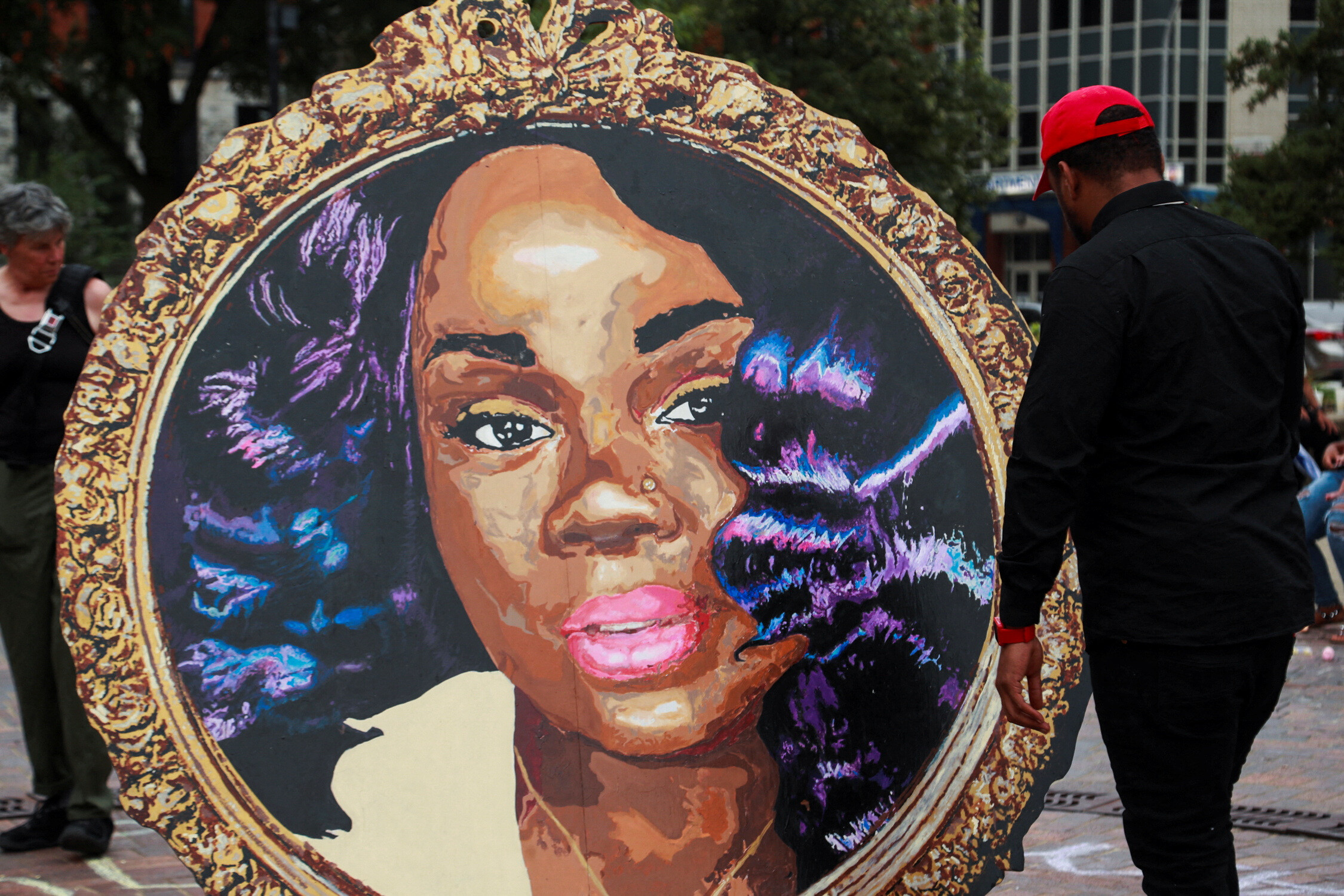 Breonna Taylor’s art is seen in Jefferson Square after the announcement that the FBI arrested and brought civil rights charges against four current and former Louisville police officers for their roles in the 2020 fatal shooting of Breonna Taylor, in Louisville, Kentucky, U.S., August 4, 2022.