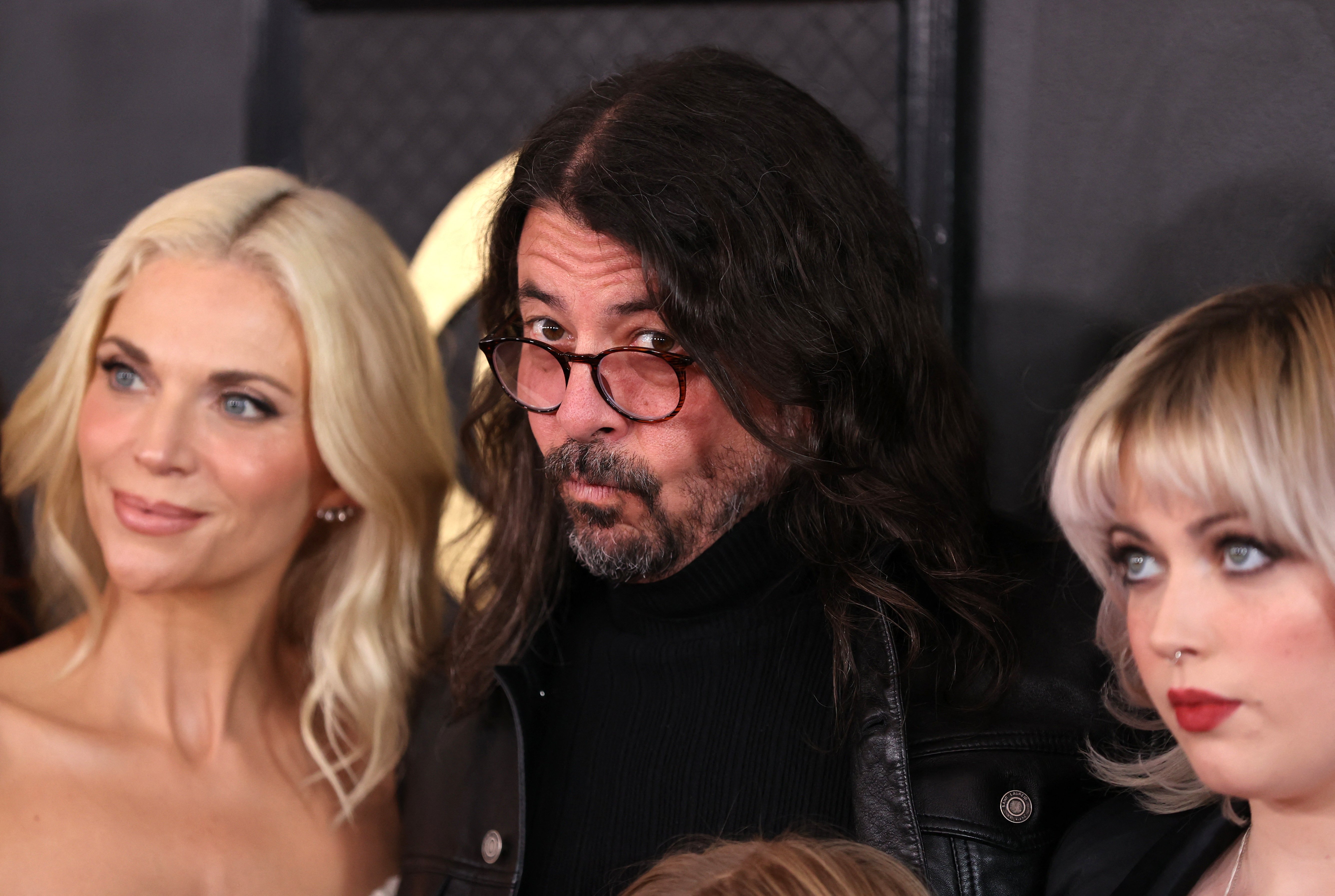 Dave Grohl and family attend the 65th Annual Grammy Awards in Los Angeles, California, U.S., February 5, 2023. REUTERS/David Swanson