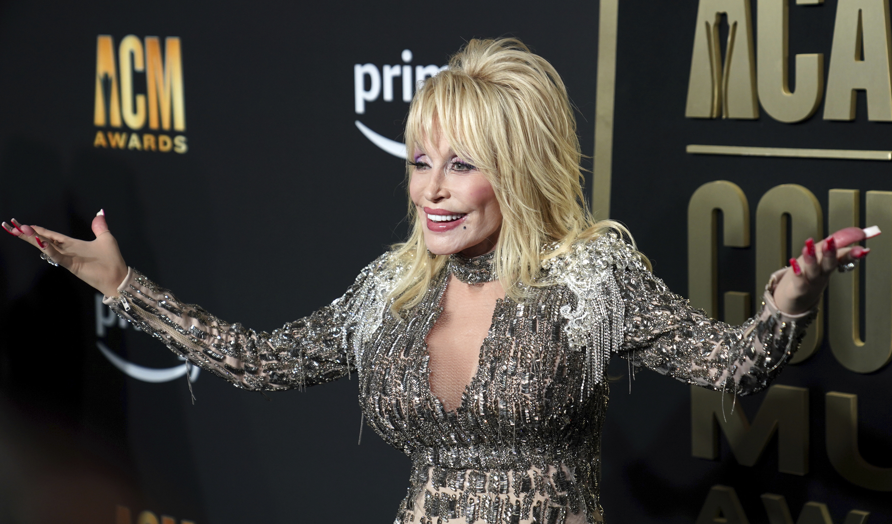 Dolly Parton arrives at the 58th annual Academy of Country Music Awards on Thursday, May 11, 2023, at the Ford Center in Frisco, Texas. (AP Photo/Jeffrey McWhorter)