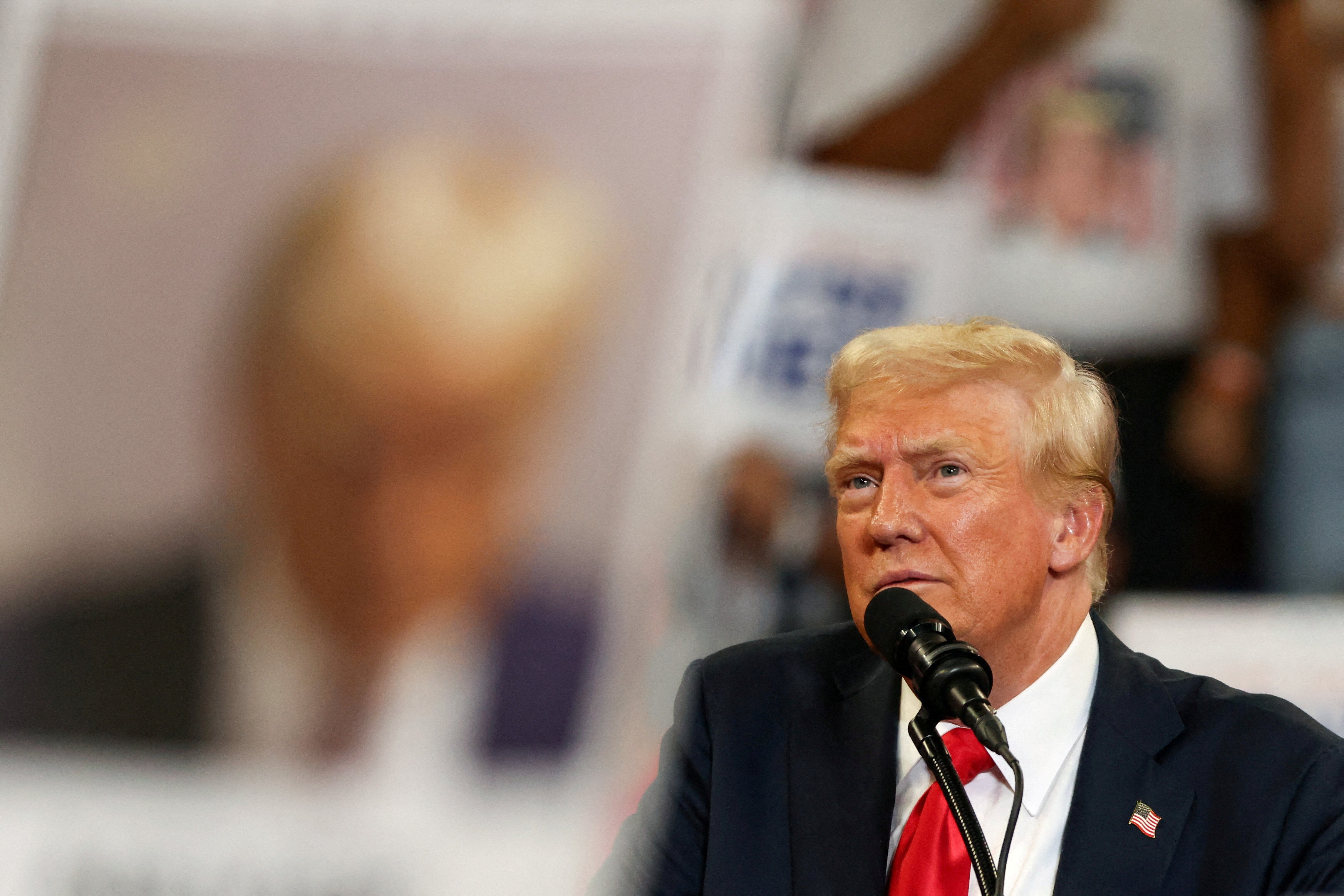 Republican presidential nominee and former U.S. President Donald Trump attends a campaign rally held with Republican vice presidential nominee Senator JD Vance, in Atlanta, Georgia, U.S., August 3, 2024. REUTERS/Umit Bektas 