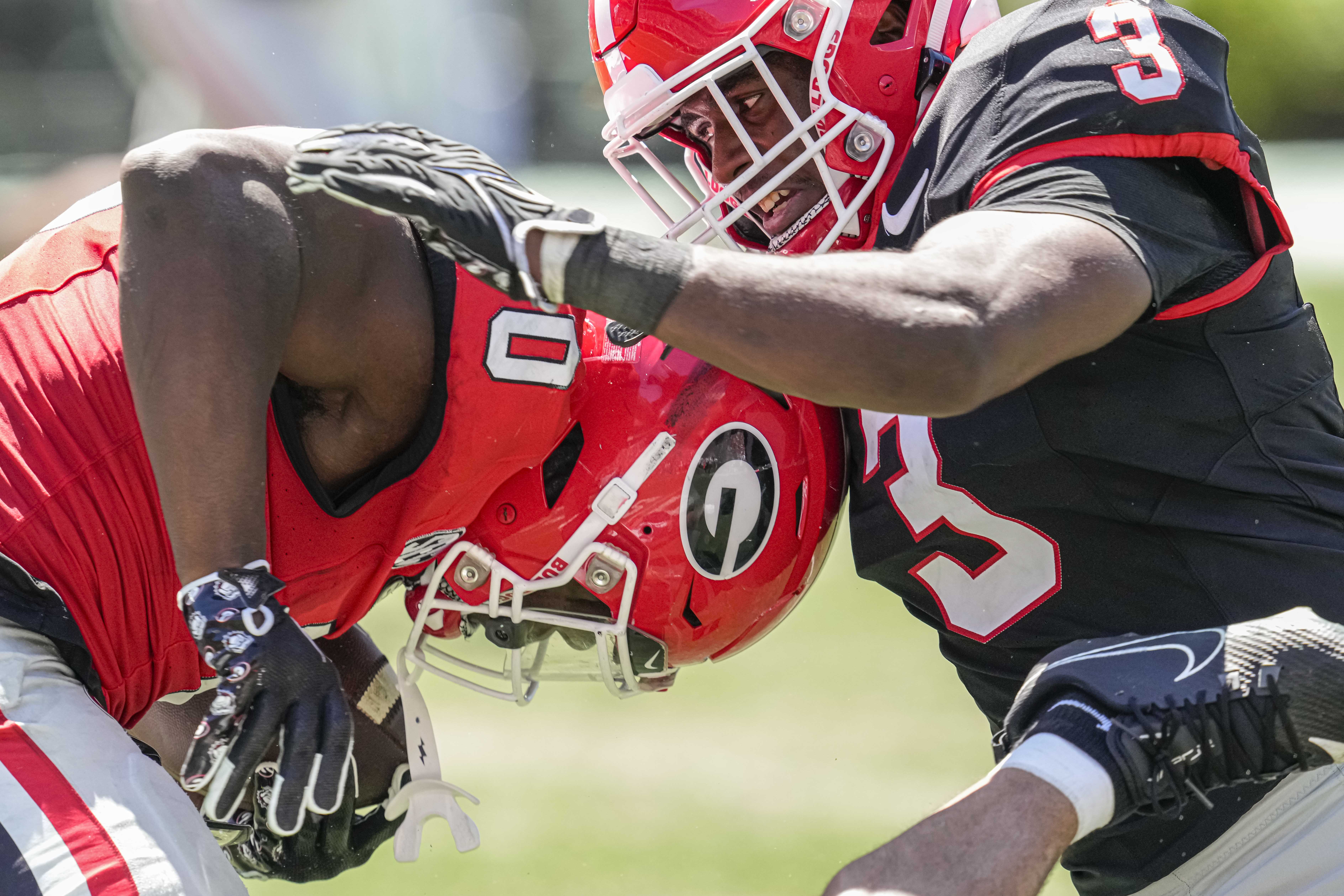 Apr 13, 2024; Athens, GA, USA; Georgia Bulldogs linebacker CJ Allen (3) tackles running back Roderick Robinson II during the G-Day Game at Sanford Stadium. Mandatory Credit: Dale Zanine-USA TODAY Sports