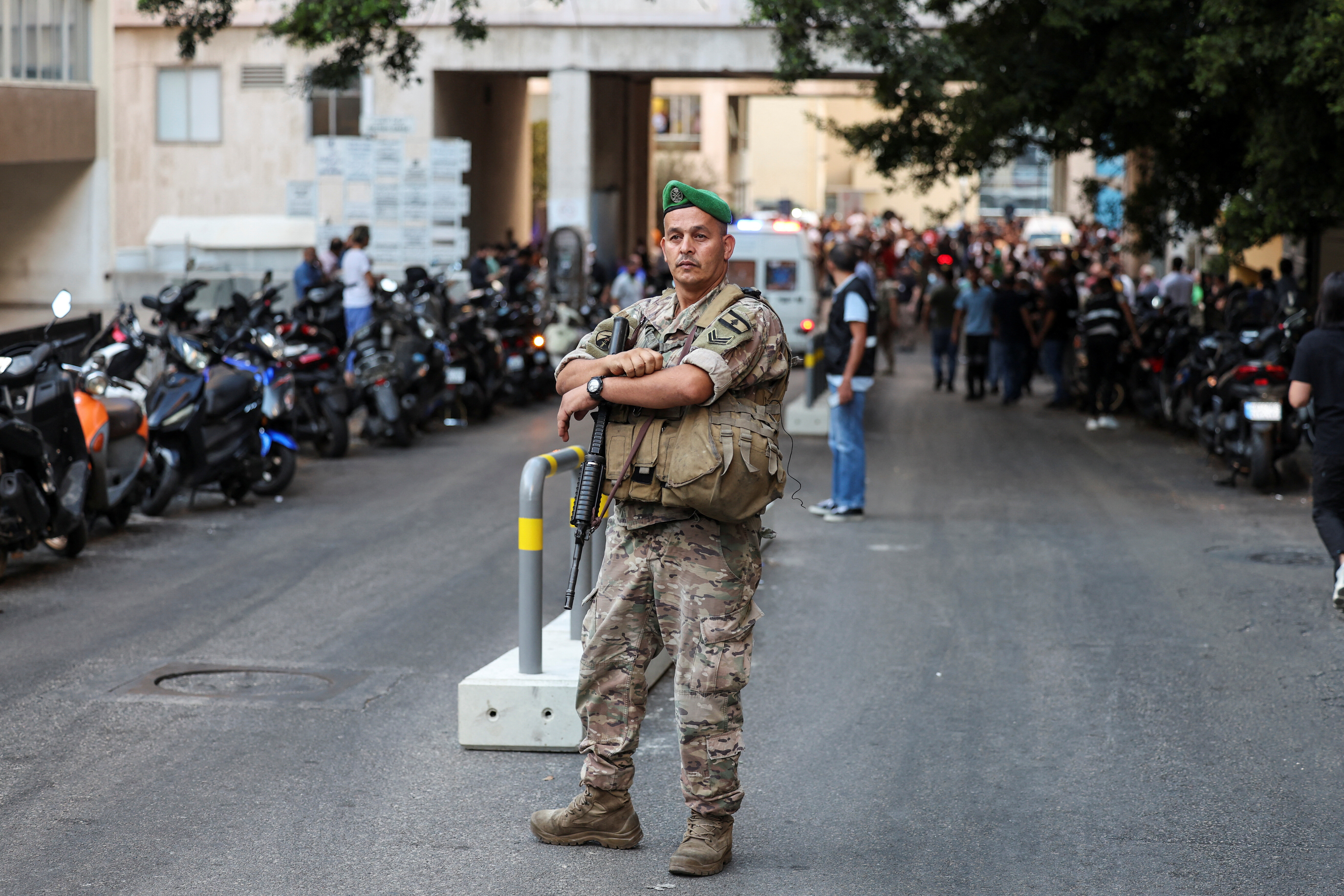 A soldier looks on near American University of Beirut Medical Center (AUBMC) as more than 1,000 people, including Hezbollah fighters and medics, were wounded when the pagers they use to communicate exploded across Lebanon, according to a security source, in Beirut, Lebanon September 17, 2024. REUTERS/Mohamed Azakir