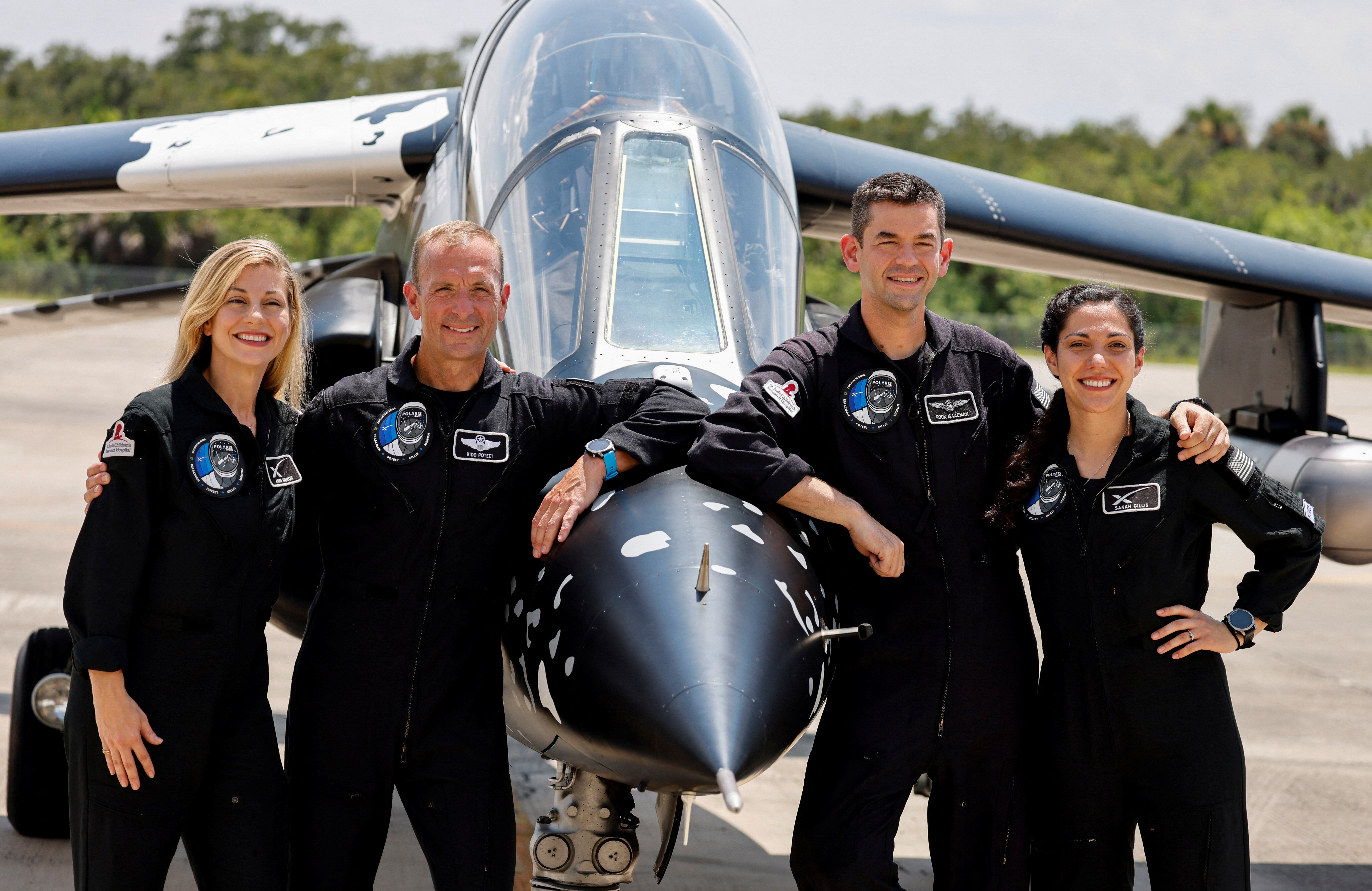 Anna Menon, Scott Poteet, commander Jared Isaacman and Sarah Gillis, crew members of Polaris Dawn, a private human spaceflight mission, attend a press conference at the Kennedy Space Center in Cape Canaveral, Florida, U.S. August 19, 2024. Launch aboard a SpaceX Falcon 9 rocket is scheduled for August 26. REUTERS/Joe Skipper