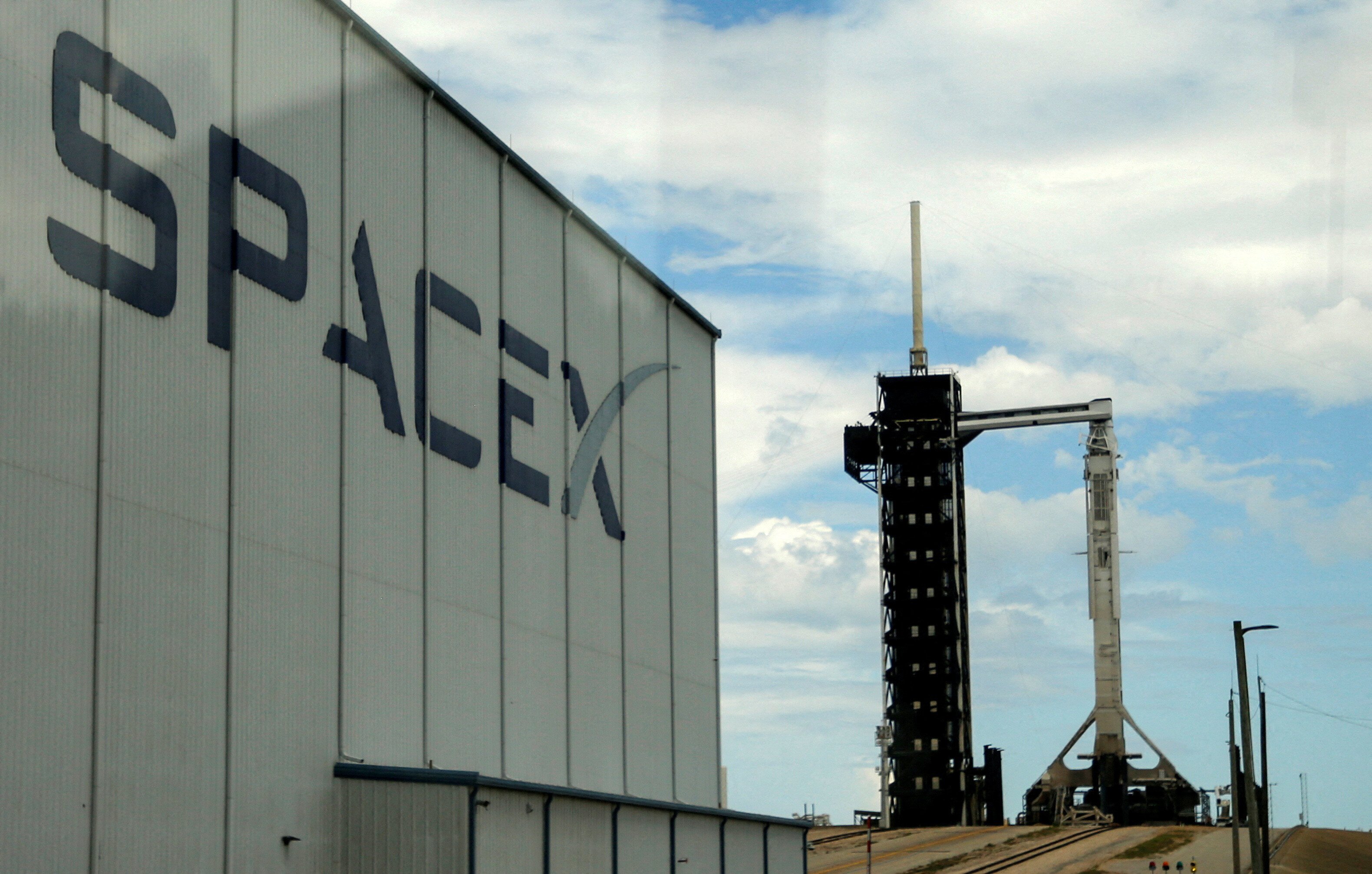 FILE PHOTO: A SpaceX Falcon 9 rocket is prepared for launch of Polaris Dawn, a private human spaceflight mission, at the Kennedy Space Center in Cape Canaveral, Florida, U.S. August 26, 2024. REUTERS/Joe Skipper