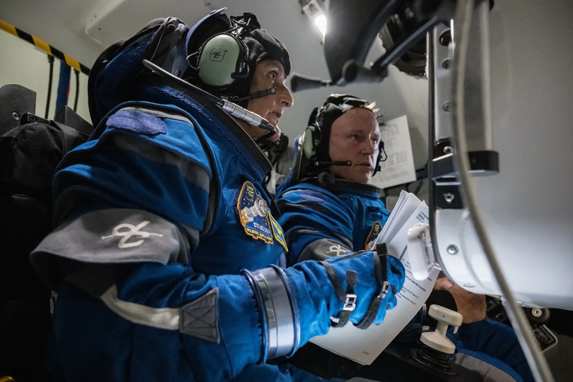 NASA’s Boeing Crew Flight Test Astronauts Butch Wilmore and Suni Williams prepare for their mission in the company’s Starliner spacecraft simulator at the agency’s Johnson Space Center in Houston. credit: NASA/Robert Markowitz