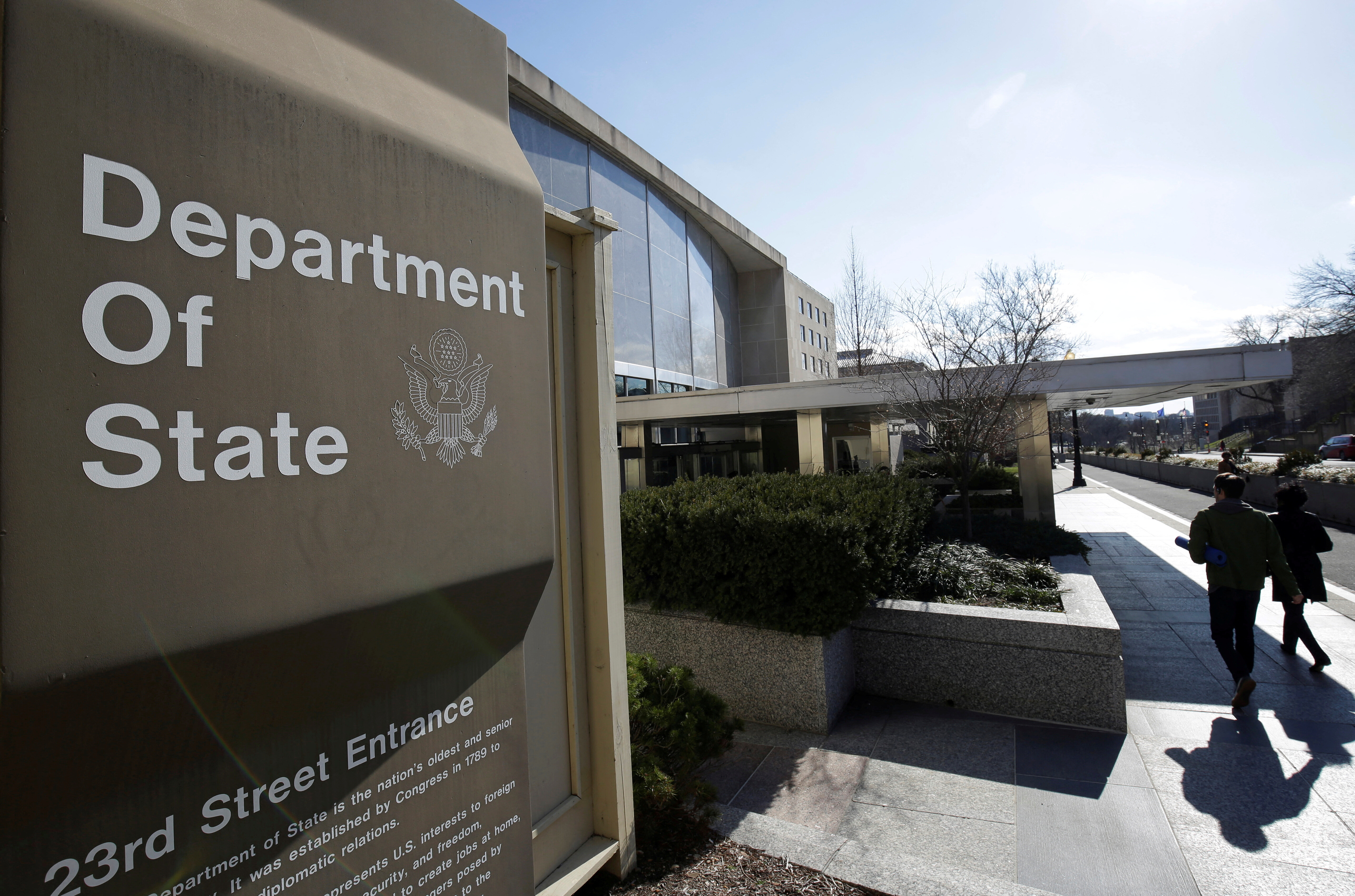 People enter the State Department building in Washington, U.S., January 26, 2017. REUTERS/Joshua Roberts/File Photo