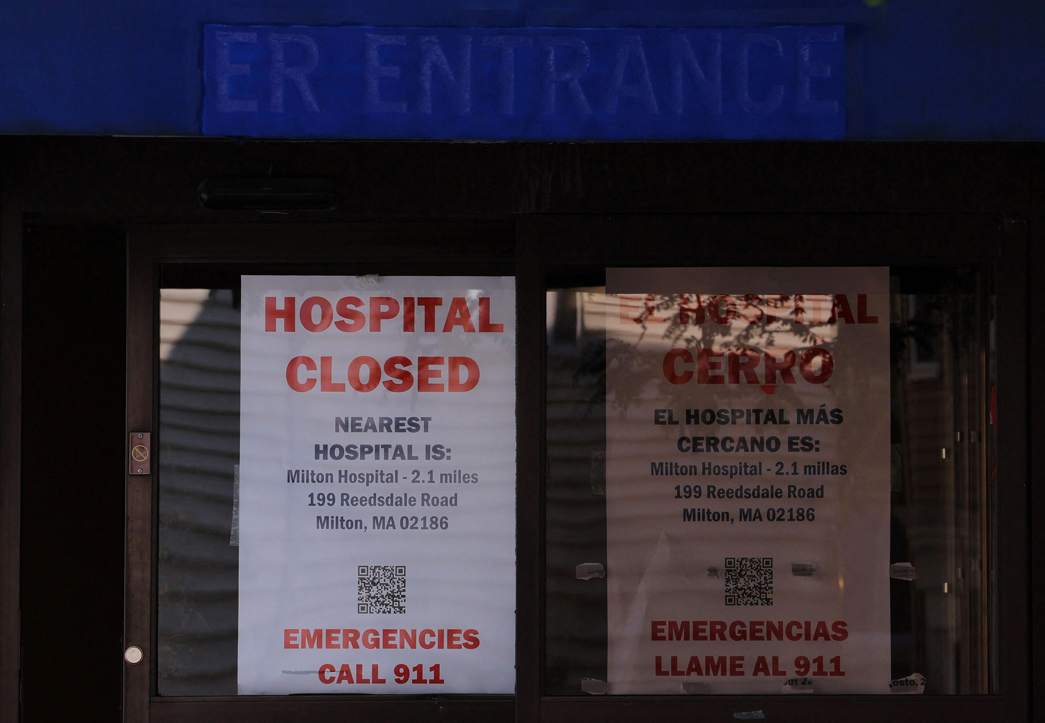 Signs on the ER Entrance of the shuttered Carney Hospital, which is owned by bankrupt hospital operator Steward Health Care, read 