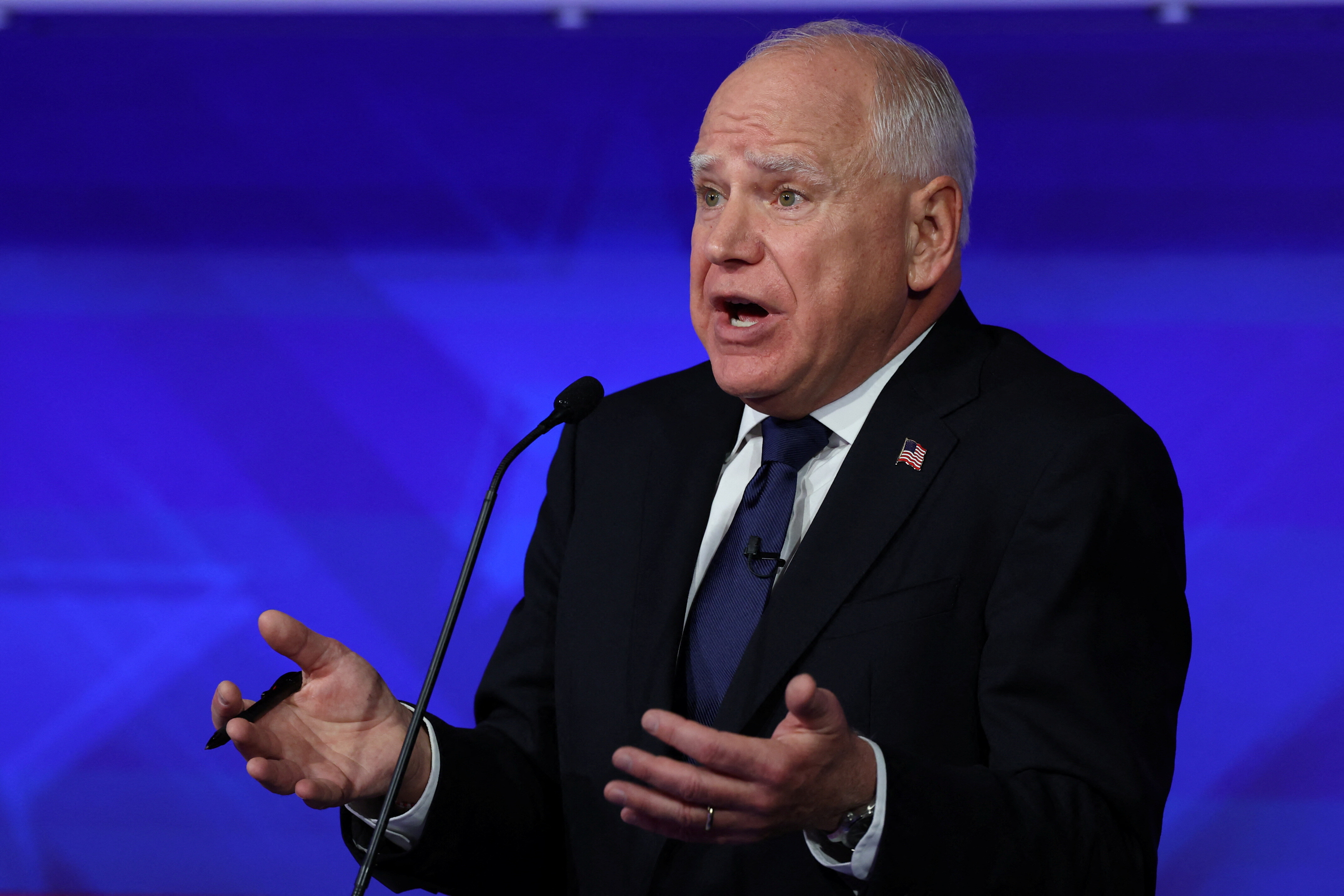 Democratic vice presidential nominee Minnesota Governor Tim Walz gestures as he speaks during a debate with Republican vice presidential nominee U.S. Senator JD Vance (R-OH) hosted by CBS in New York, U.S., October 1, 2024. REUTERS/Mike Segar